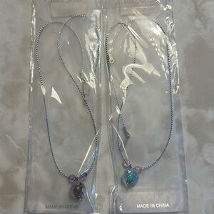 2 necklaces never been worn! 1 blue/pink 1 purple BNDL N SAVE 30%